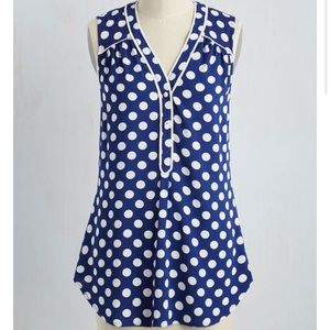 Blue and white polka dot shirt